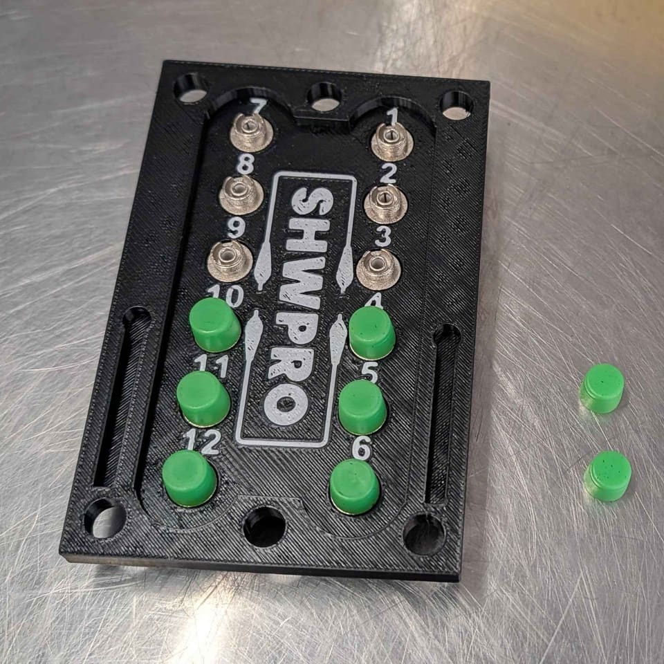 FC Patch Panel with green dust caps and ports numbered 1 to 12