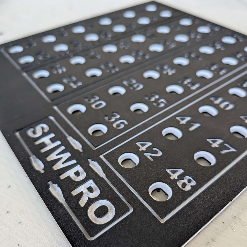 Close-up of the CNC machined numbering and SHWPRO logo on a Frame Panel